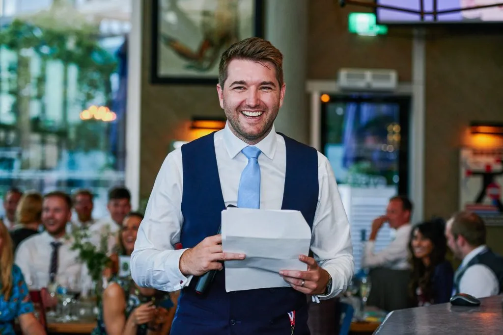 Usher laughing during wedding reception at The Oyster Shed