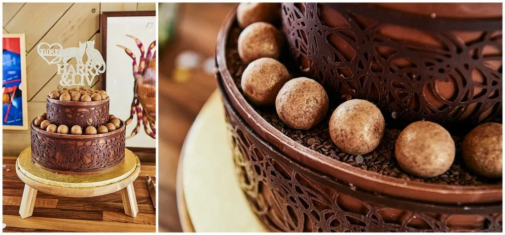 Chocolate wedding cake on wooden stand