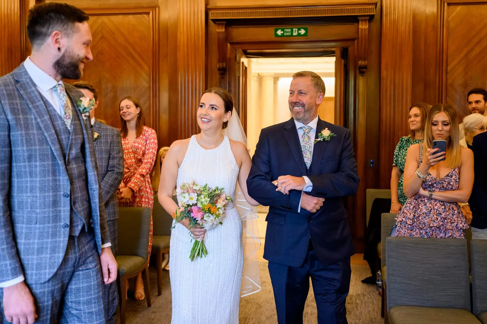 Father giving away his daughter during Marylebone Town Hall ceremony