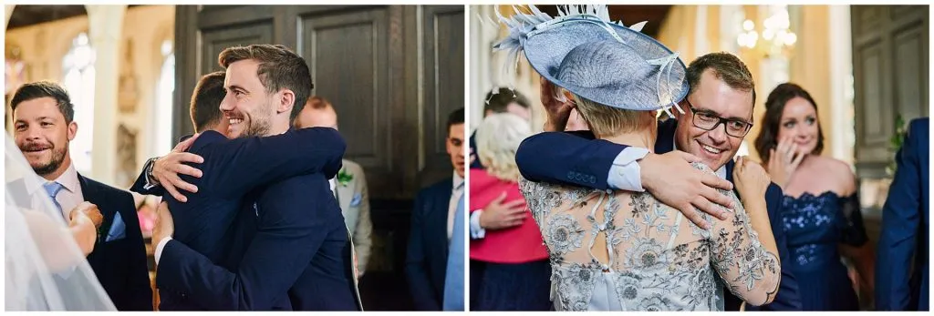 Groom and guests hugging each other after wedding ceremony. 