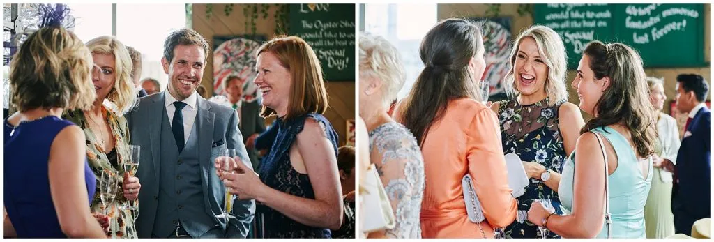 Wedding guests laughing together at The Oyster Shed in London City 
