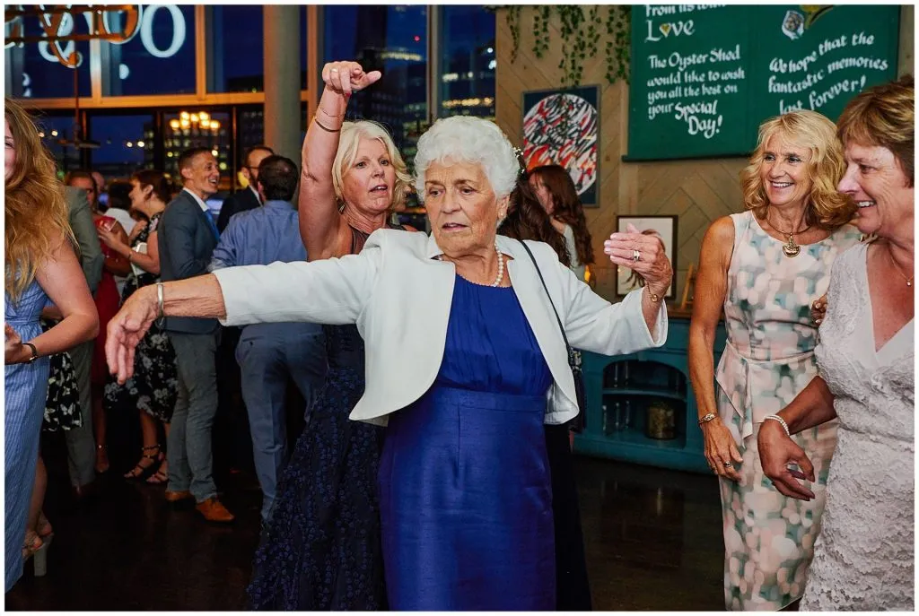 Old lady dancing at The Oyster Shed wedding venue 