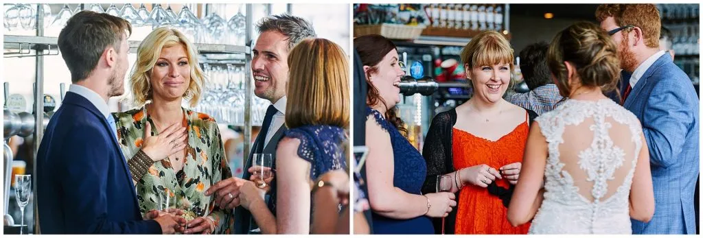 Wedding guests laughing together at The Oyster Shed in central London 