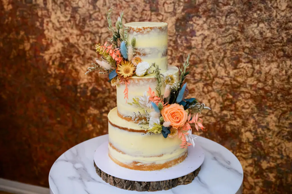 rustic wedding cake display at woodborough hall reception