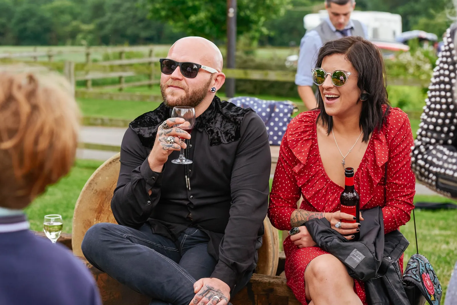 alternative wedding guests laughing during outdoor Pheasantry Brewery wedding