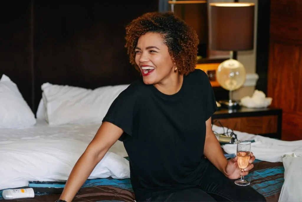 bridesmaid laughing during bridal prep