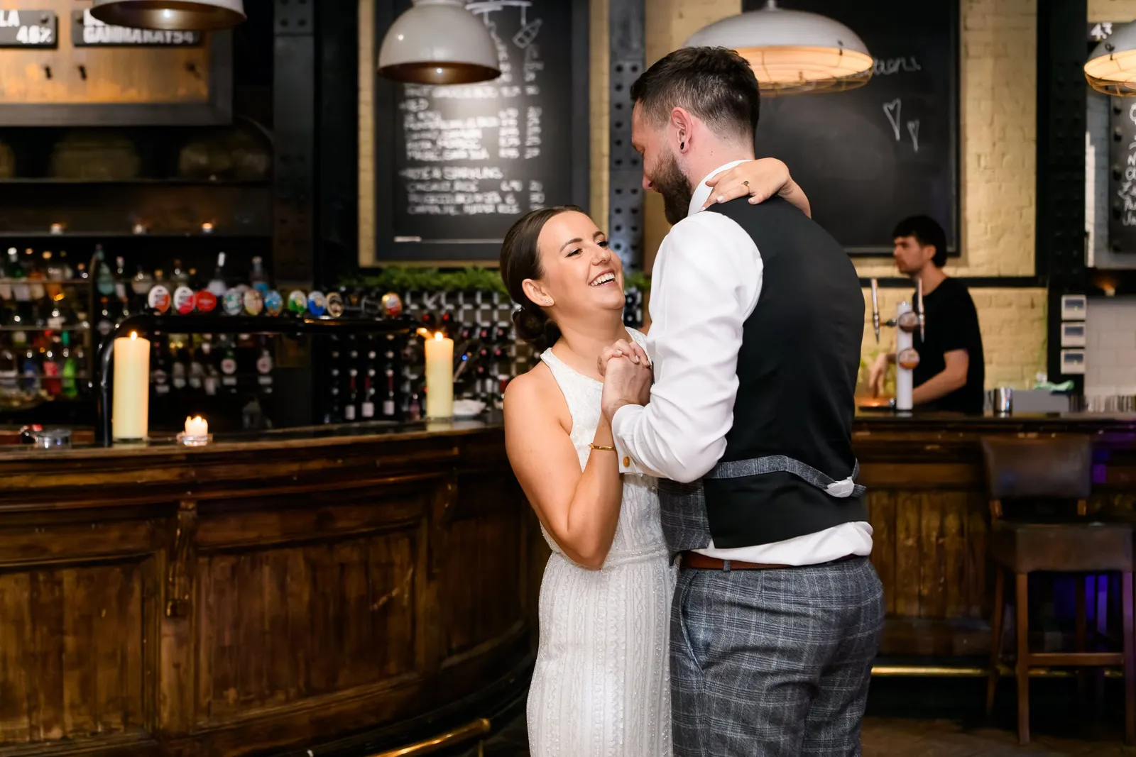 wedding couple laughing during their first dance at the Depot N7 in London