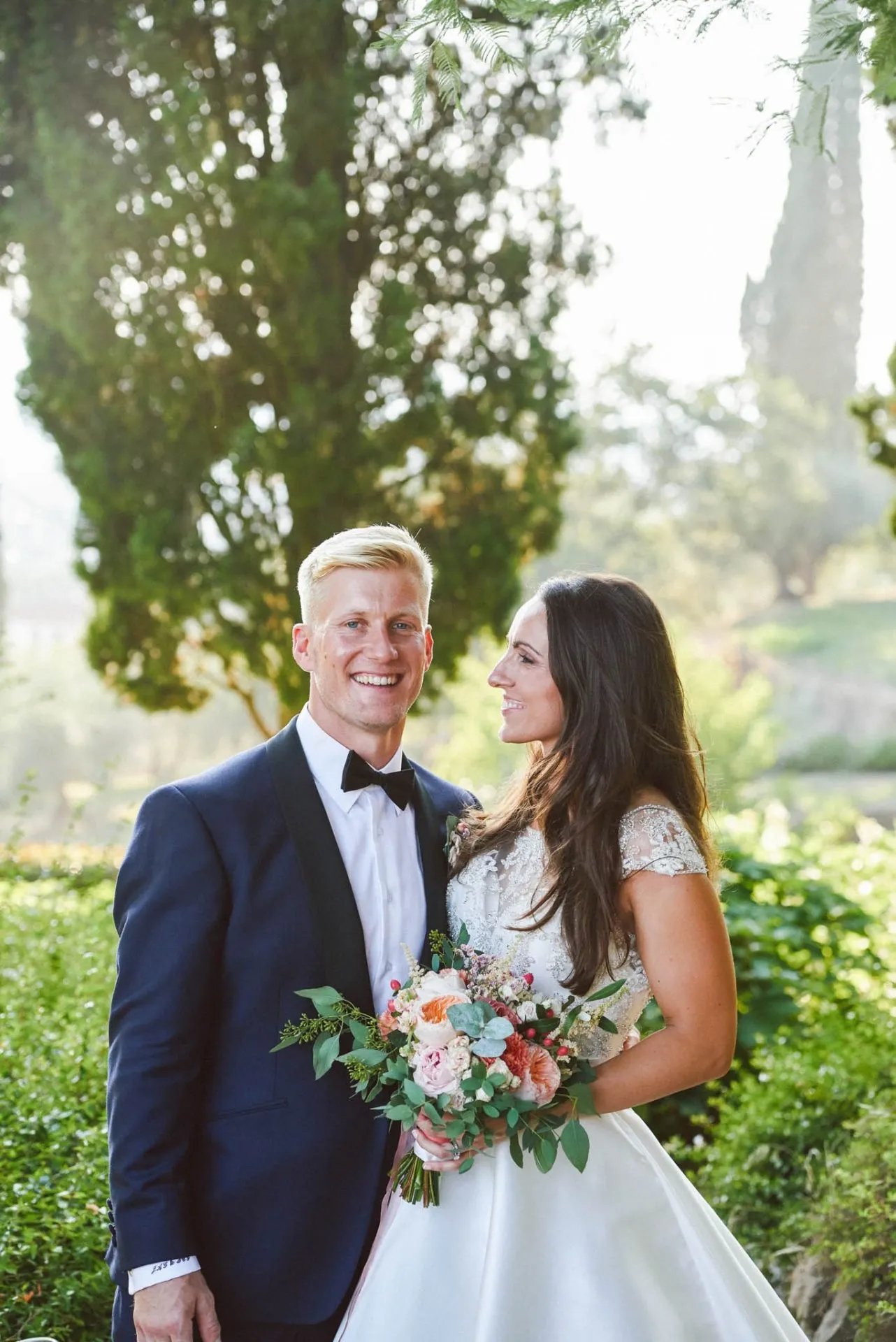 Happy wedding couple smiling together at Villa Le Fontanelle in Italy