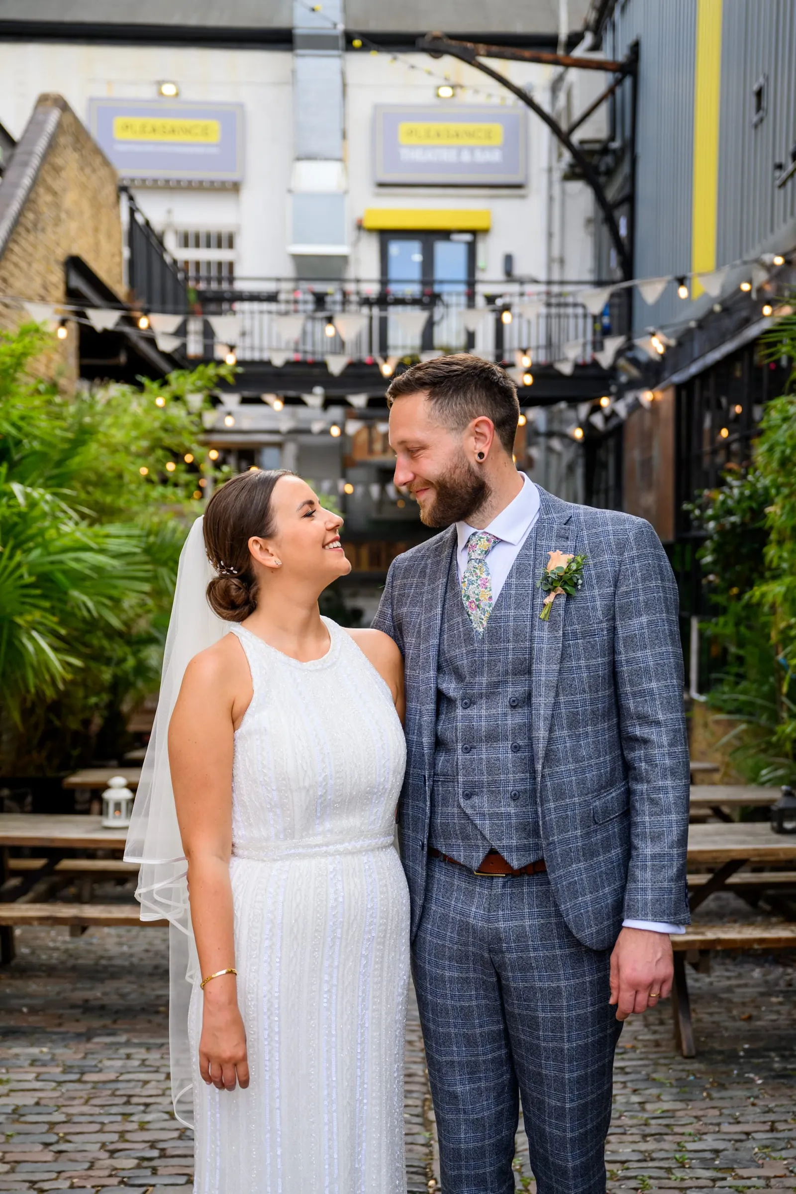 natural photography of Bride and Groom in the courtyard at the Depot N7