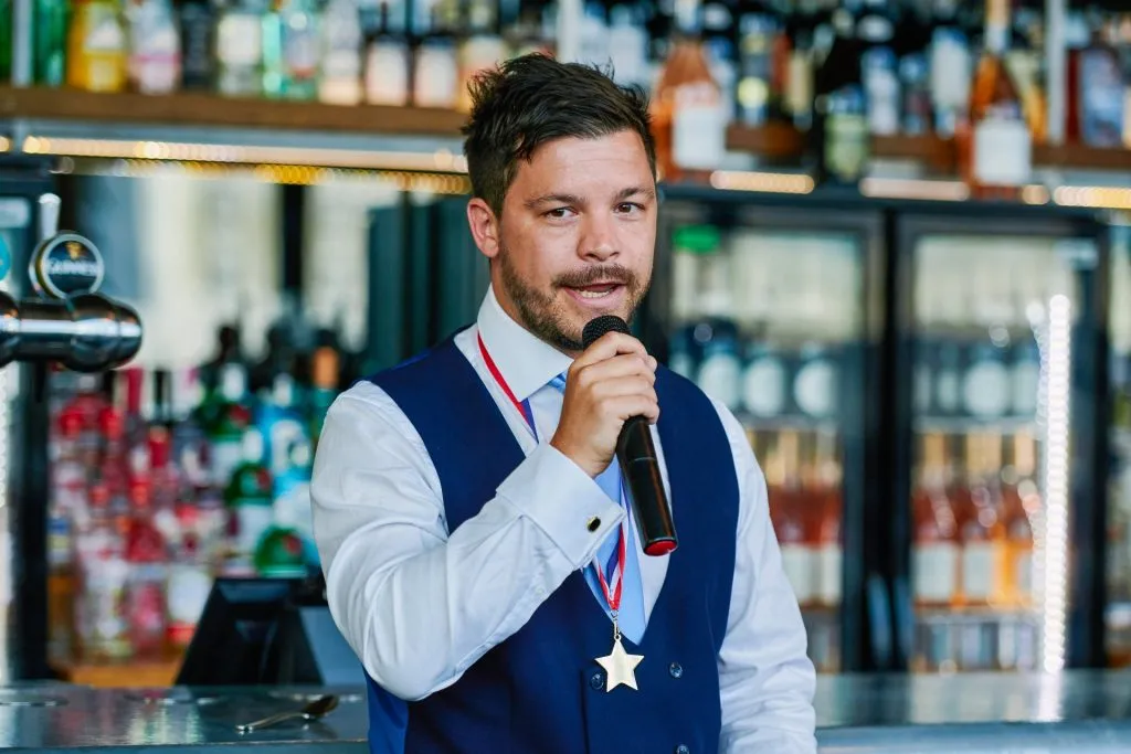 Wedding usher giving a speech at The Oyster Shed in London