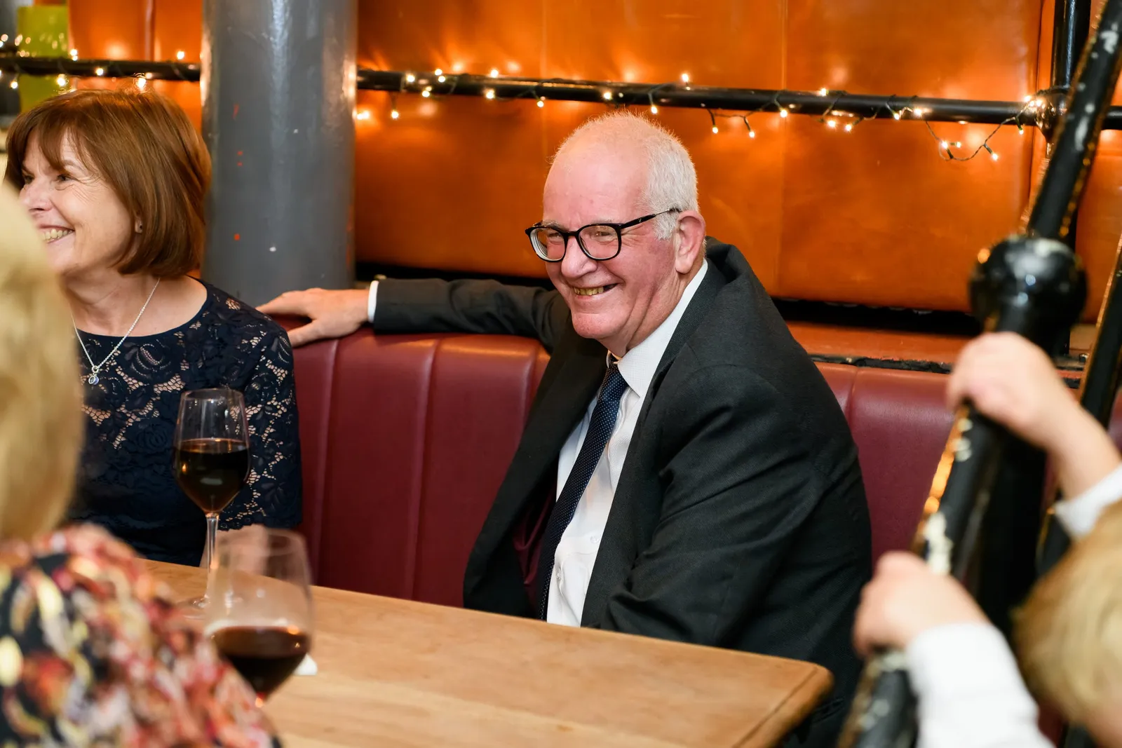 Candid photography of old man laughing during The Depot N7 wedding reception