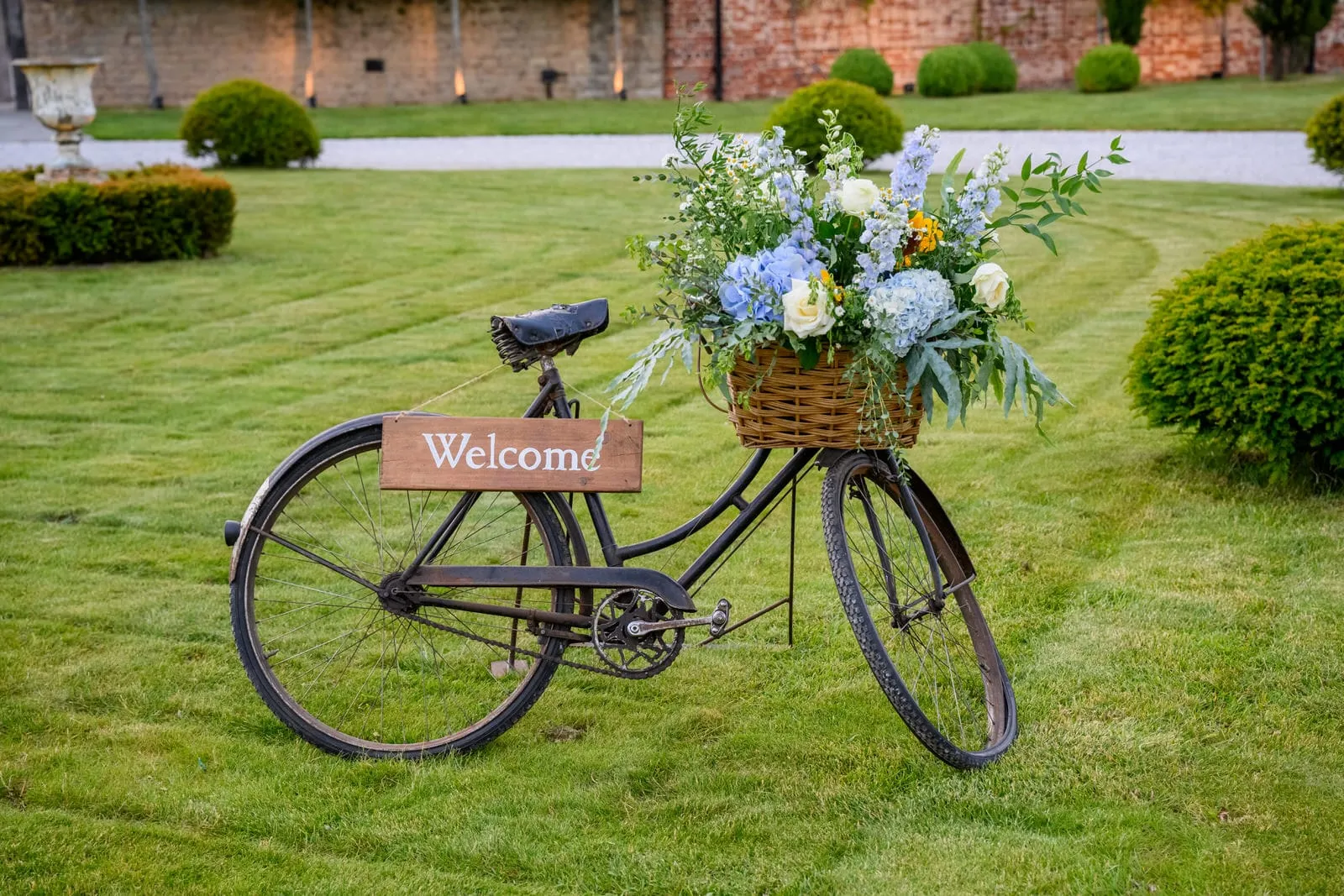 Wedding Photography featuring a bike outside of Hazel Gap Barn in Nottingham