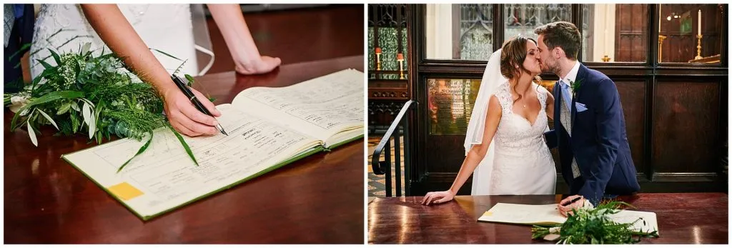 Bride and groom signing the register  after their wedding ceremony in St Margret's Church. 