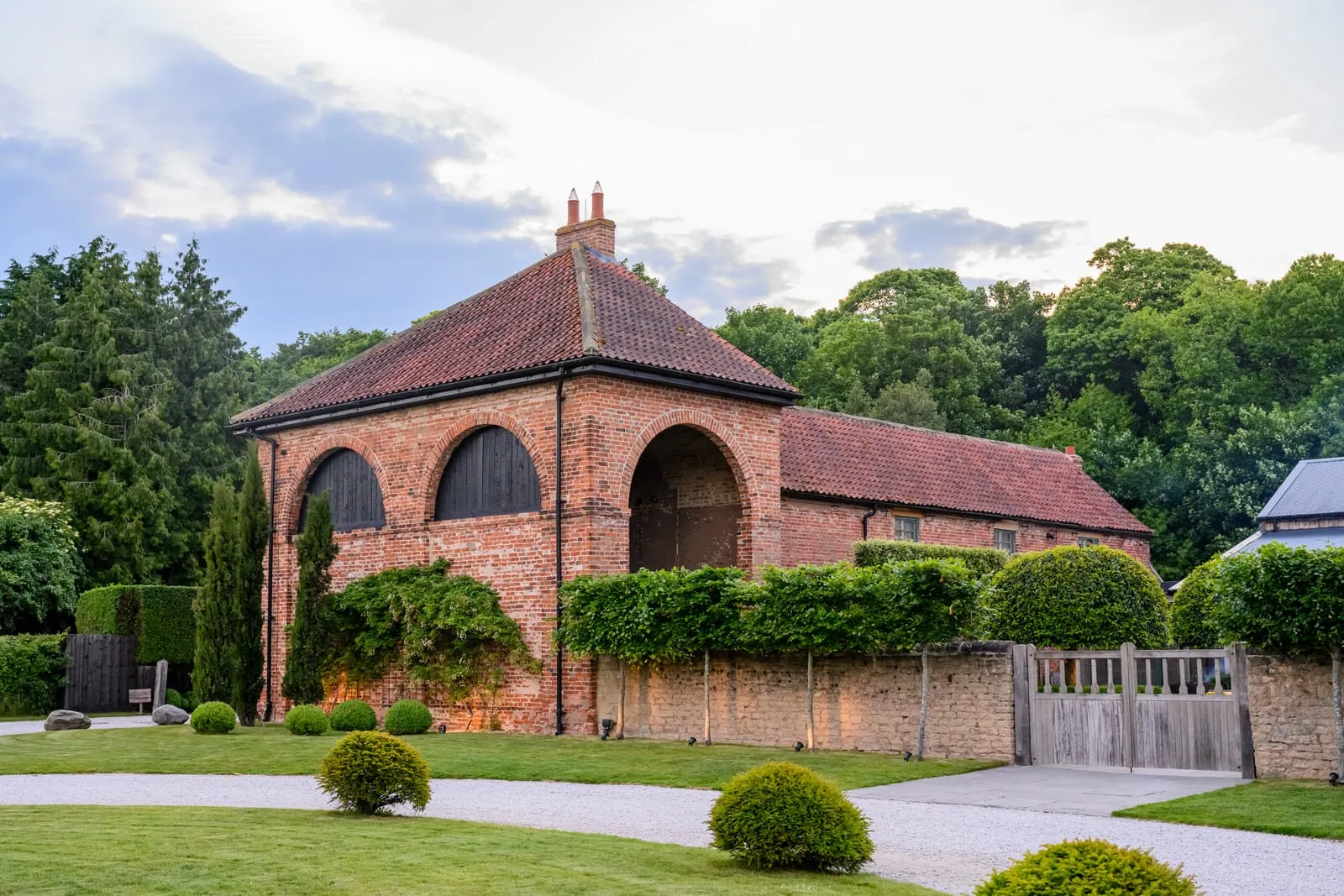 Hazel Gap Barn Wedding Photography showing one of the red brick buildings