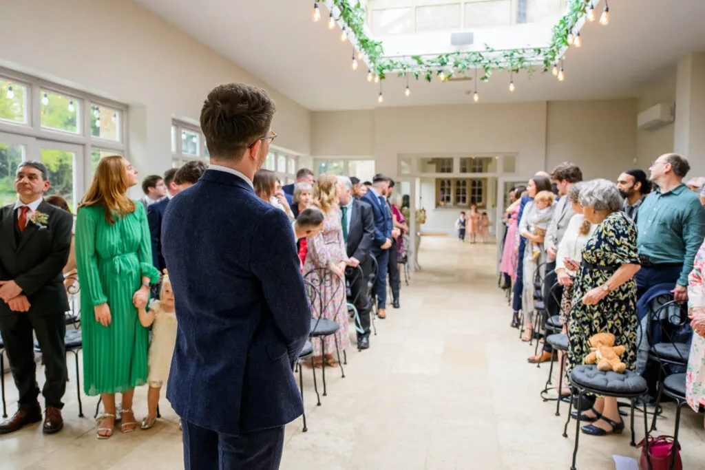 guests waiting inside orangery ceremony room woodborough hall
