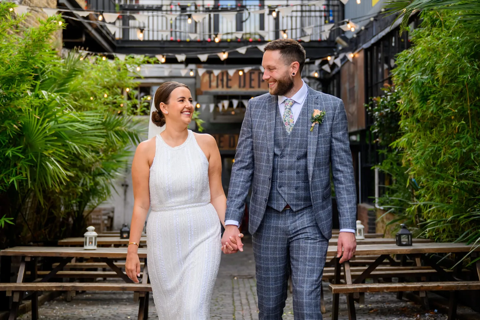 Bride and Groom smiling whilst outside during Depot N7 photography